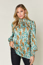 Double Take Full Size Printed Smocked Long Sleeve Blouse